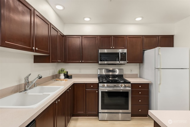 kitchen with sink and stainless steel appliances