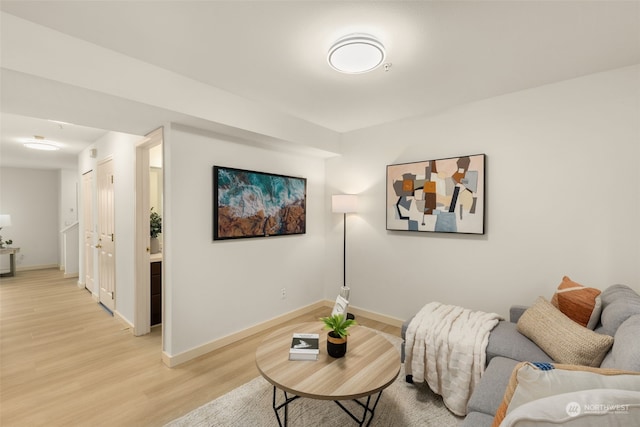 living room with light hardwood / wood-style flooring