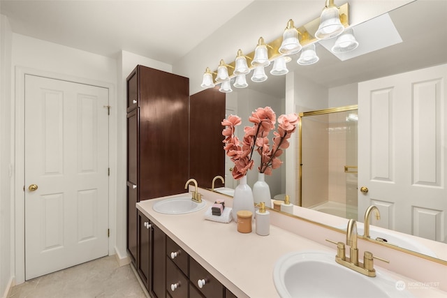 bathroom with vanity, tile patterned flooring, and washtub / shower combination