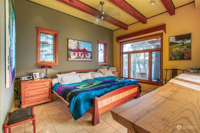 bedroom with light tile patterned flooring and beam ceiling
