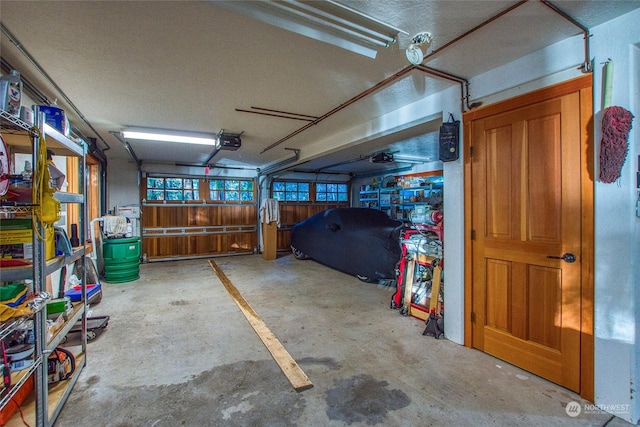 garage featuring a garage door opener