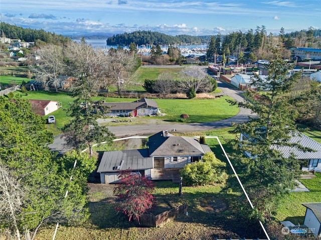 bird's eye view with a water view