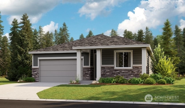 view of front of property featuring a garage and a front lawn