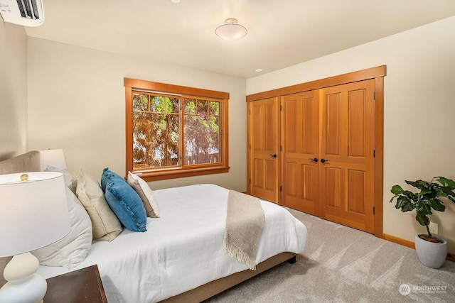 bedroom featuring carpet floors and a closet