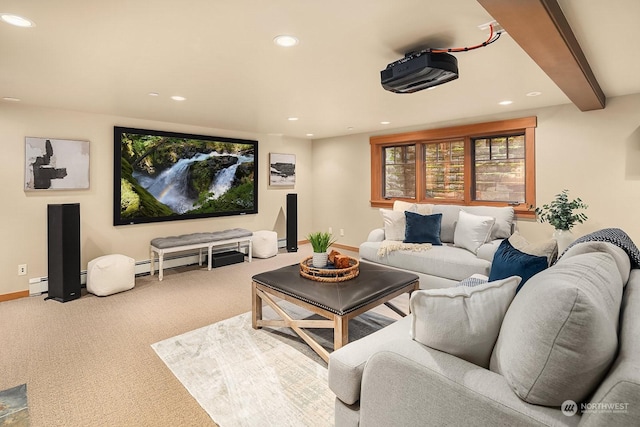 carpeted cinema with a baseboard radiator and beamed ceiling