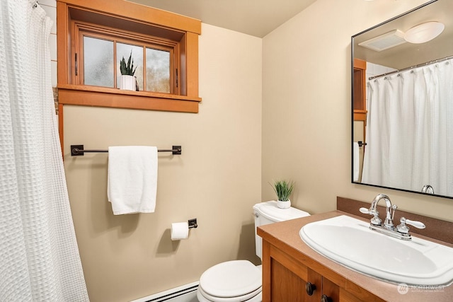 bathroom featuring baseboard heating, toilet, and vanity