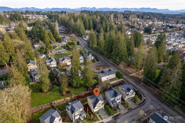 drone / aerial view featuring a mountain view