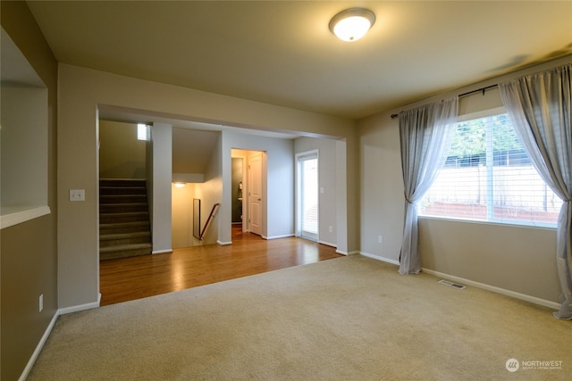 unfurnished room featuring carpet floors