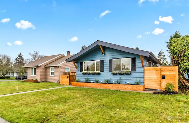 view of front of home with a front yard