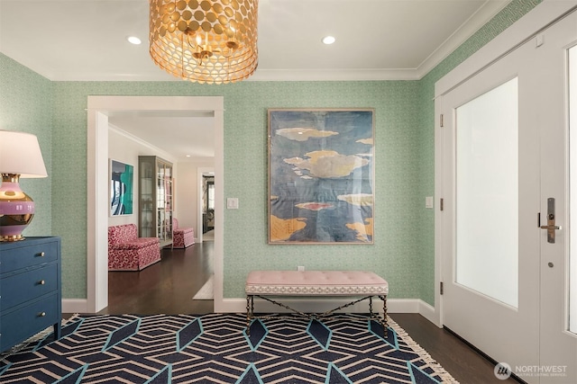 hall with baseboards, wallpapered walls, recessed lighting, ornamental molding, and dark wood-type flooring