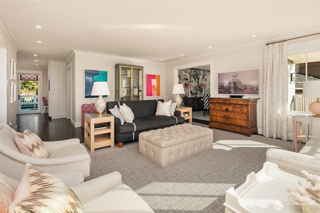 living room featuring recessed lighting and crown molding