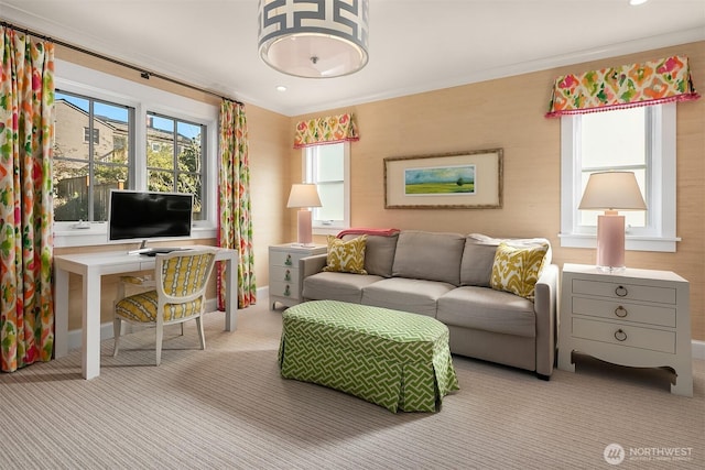 living room with plenty of natural light, carpet, and ornamental molding