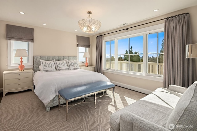 bedroom featuring recessed lighting, visible vents, baseboards, and a notable chandelier