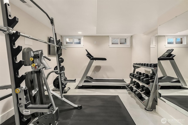 exercise area featuring recessed lighting and visible vents