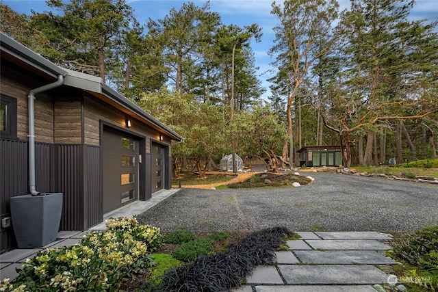 view of yard with a garage