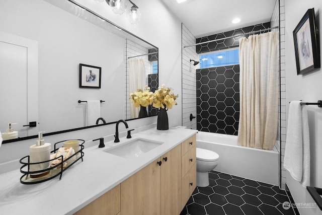 full bathroom featuring toilet, shower / tub combo, tile patterned floors, and vanity