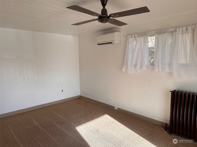spare room with radiator, a wall mounted AC, and carpet