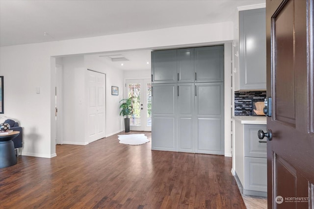 entryway with dark wood-type flooring