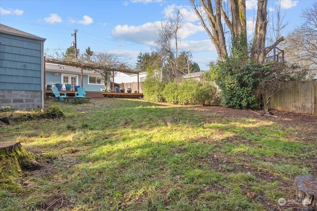 view of yard with a deck