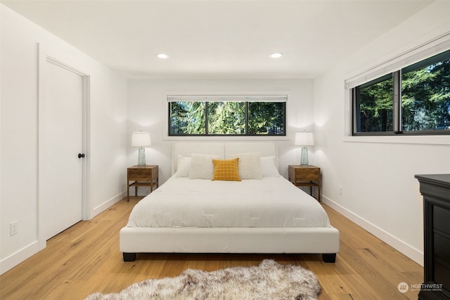 bedroom featuring light wood-type flooring