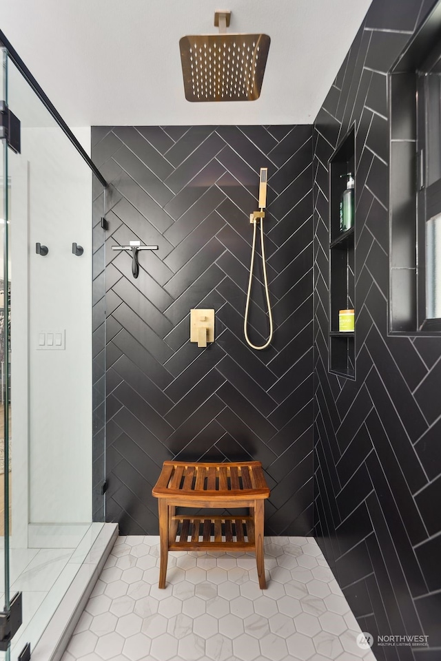 bathroom featuring tile patterned flooring and a shower