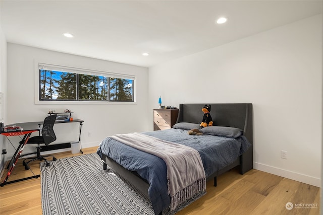 bedroom with light wood-type flooring