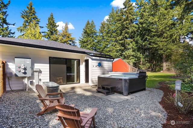 view of patio with a hot tub