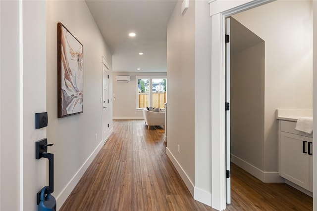 5986 Ranch Loop, Ferndale, WA 98248 - hallway featuring dark wood finished floors, recessed lighting, baseboards, and an AC wall unit