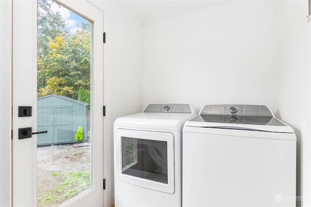 washroom with separate washer and dryer