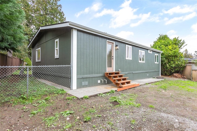 back of property featuring a patio area