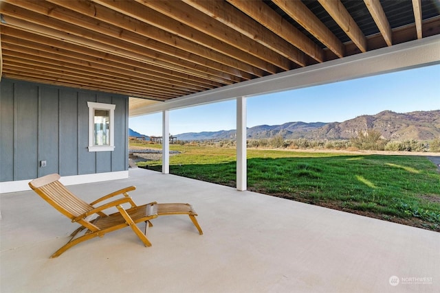 view of patio with a mountain view