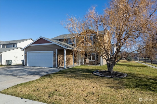 view of front of home with a garage and a front lawn