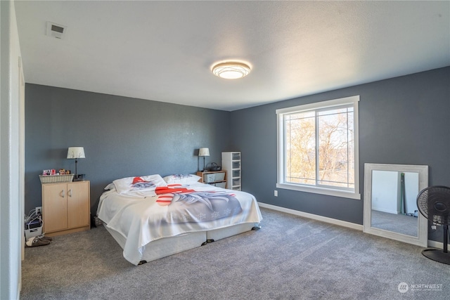 bedroom featuring carpet