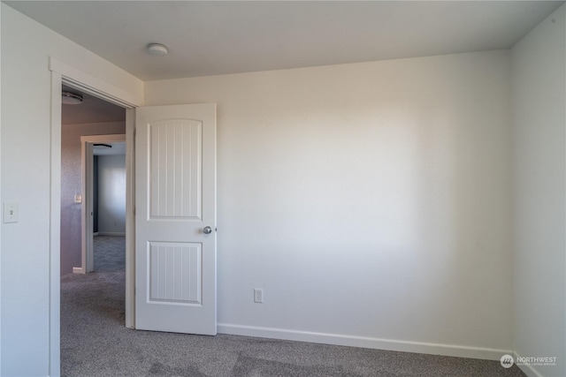 empty room featuring carpet