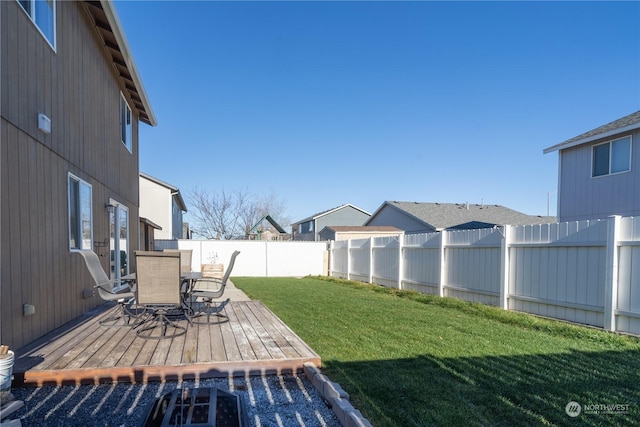 view of yard featuring a wooden deck