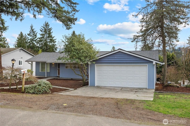 single story home with driveway, a garage, and roof with shingles