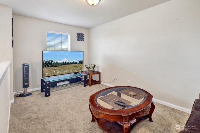 living area with light colored carpet