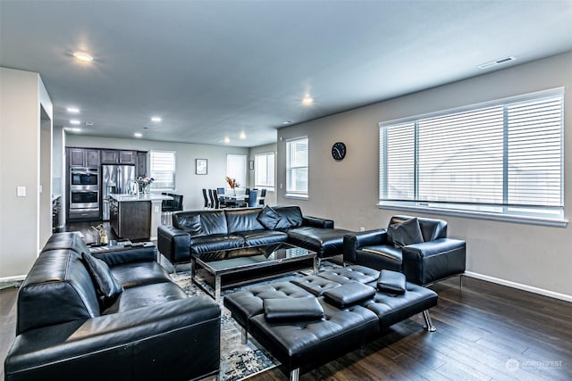 living room featuring dark hardwood / wood-style floors