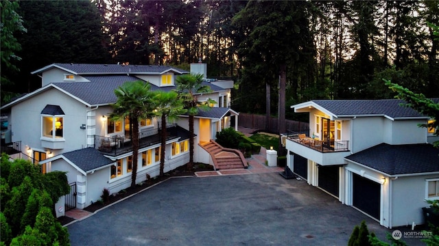 view of front of house with a balcony