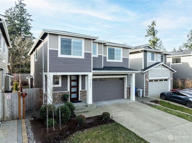 view of front of property with a garage