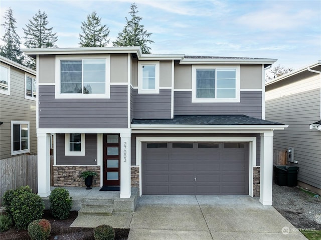 view of front of property with a garage