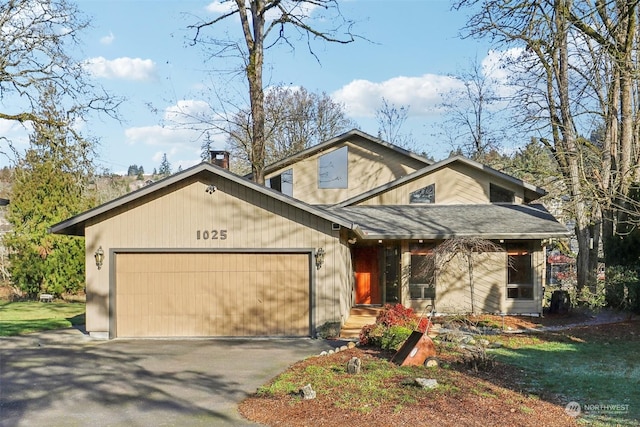 view of front of property featuring a garage