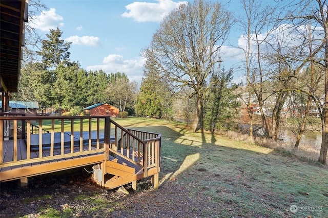 view of yard with a wooden deck