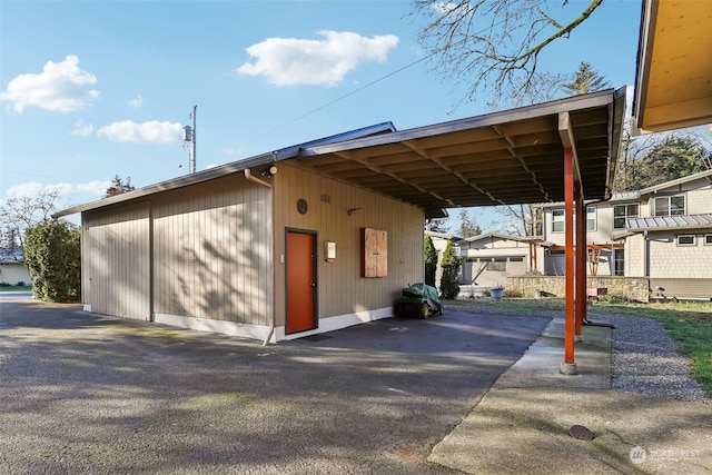 view of parking featuring a carport