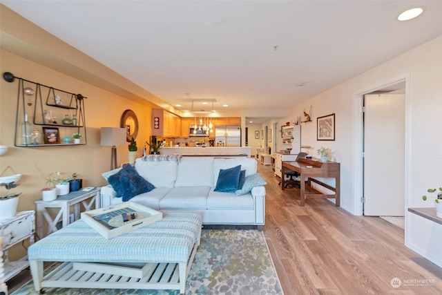 living room with light hardwood / wood-style floors