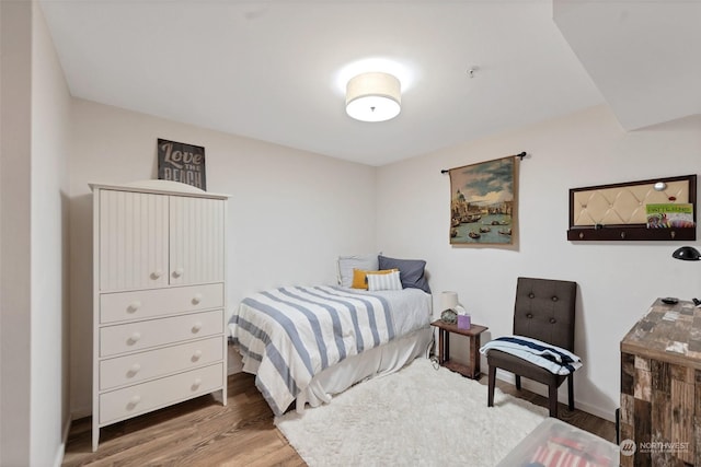 bedroom featuring hardwood / wood-style floors