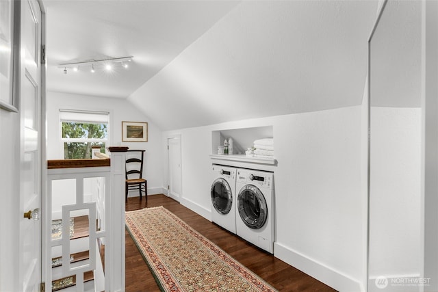 laundry room with track lighting, baseboards, dark wood finished floors, laundry area, and independent washer and dryer