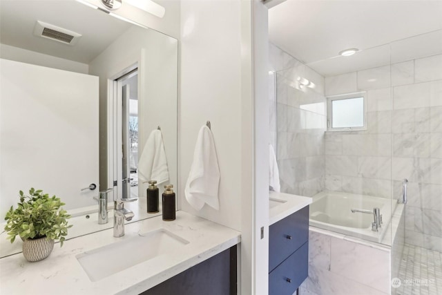 bathroom featuring independent shower and bath and vanity