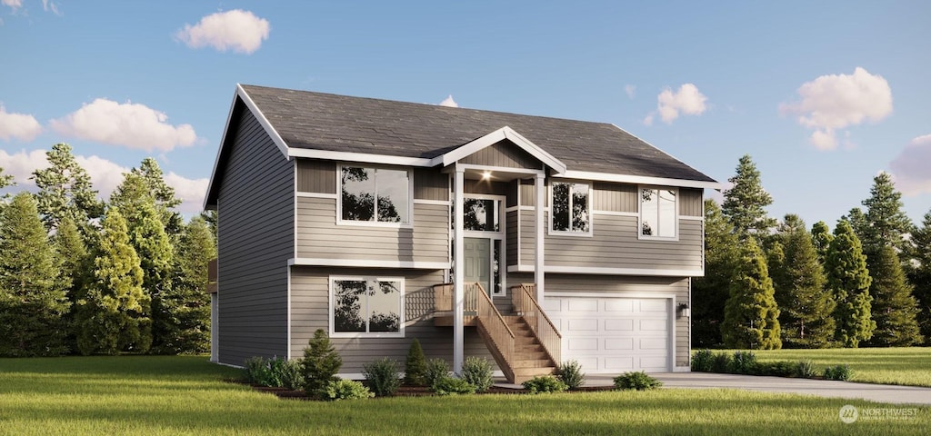 split foyer home featuring a garage and a front lawn