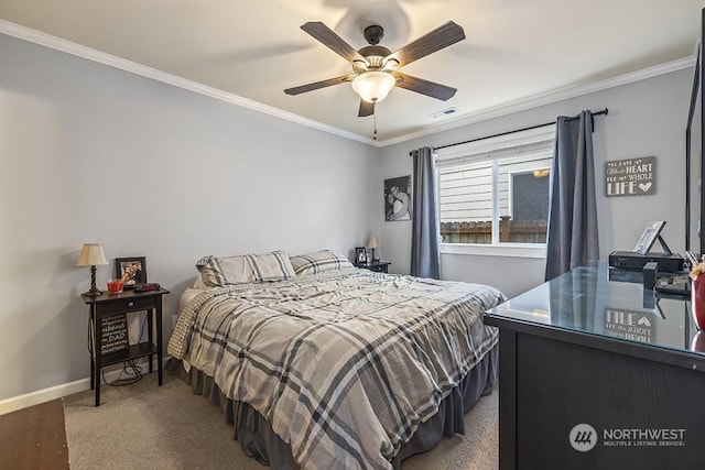 bedroom featuring ornamental molding and ceiling fan